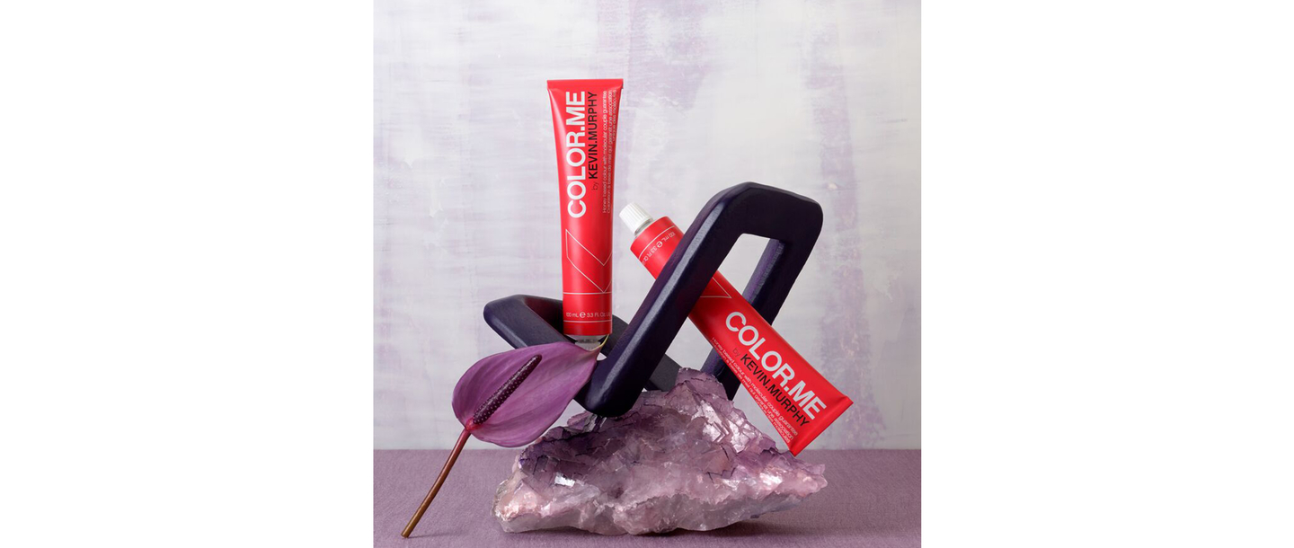 Red hair color tubes with salon chair and purple flower on amethyst base